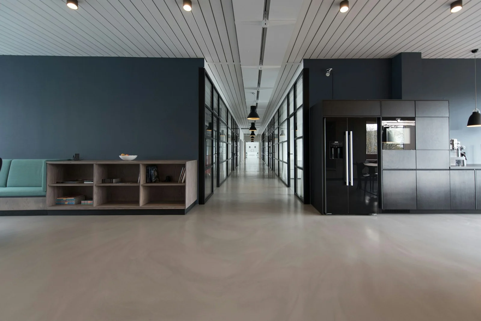 A bright office interior with desks and daylight